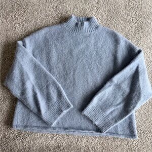 Light blue wool mock neck sweater